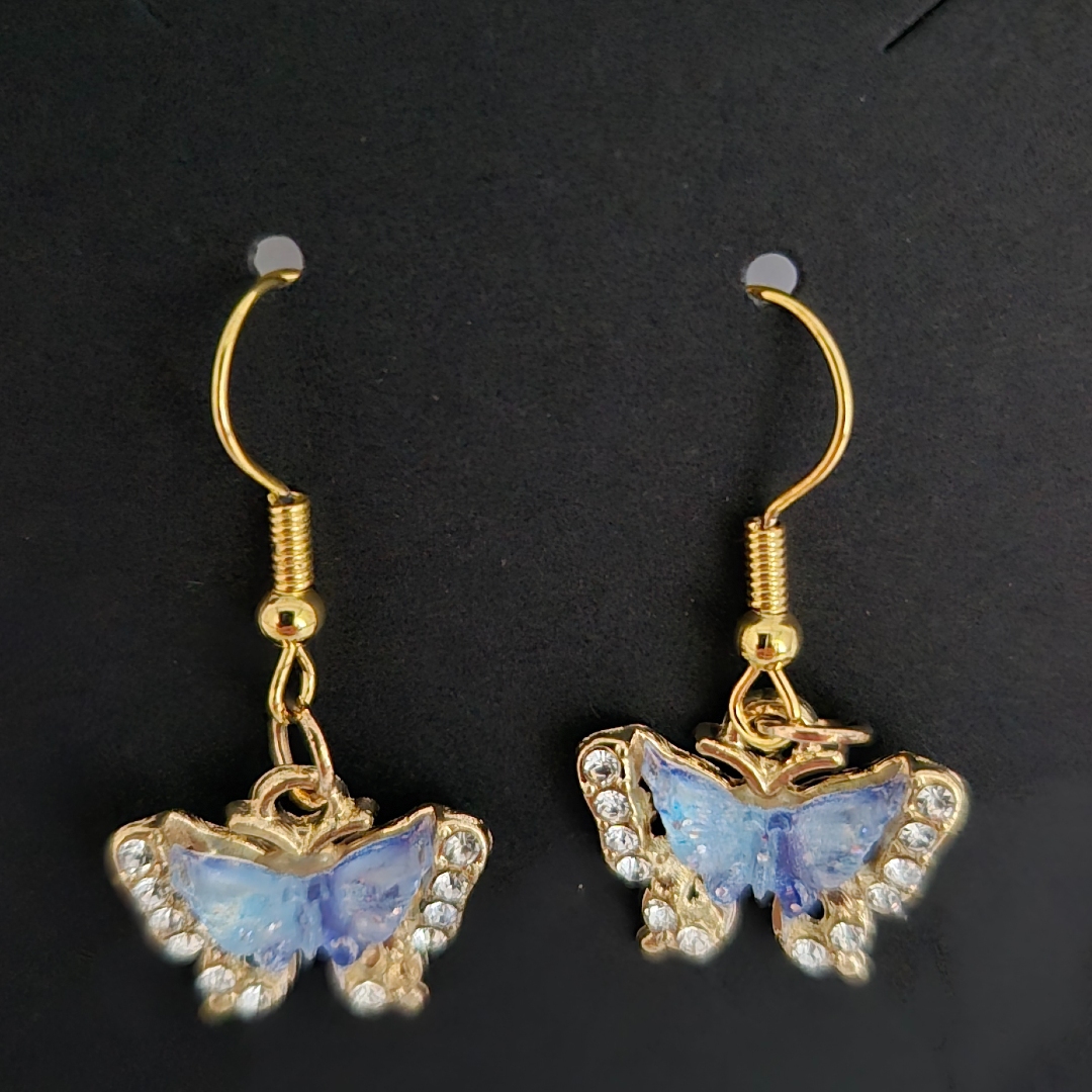 Schmetterling Blau mit Steinen